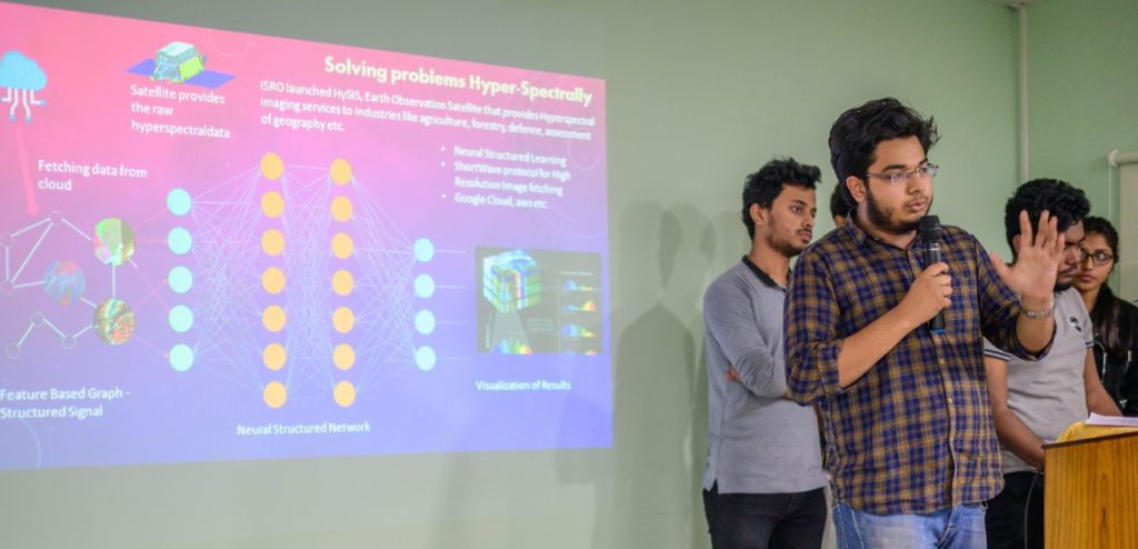Munshi's team giving the presentation in the hackathon finals.